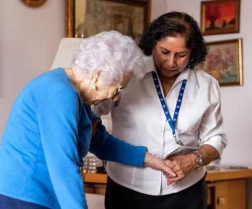 CCA assisting a client, walking